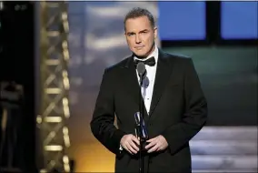  ?? CHARLES SYKES — THE ASSOCIATED PRESS FILE ?? Comedian-actor Norm Macdonald appears onstage April 28, 2012at The 2012Comedy Awards in New York.