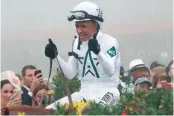  ??  ?? Mike Smith (above) rode Justify to victory in the Preakness, keeping alive the chance at another Triple Crown for trainer Bob Baffert.