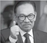  ??  ?? Liderul opoziției din Malaezia, Anwar Ibrahim
