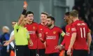  ?? Photograph: James Gill/Danehouse/Getty Images ?? Marcus Rashford (second from right) is sent off after a VAR review.