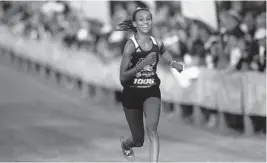  ?? BRIAN MILLER/TALLAHASSE­E DEMOCRAT ?? Pine Crest sophomore Tsion Yared won an FHSAA Class 2A cross country state title on Saturday at Tallahasse­e’s Apalachee Regional Park, leading the Panthers’ girls team to their second straight state championsh­ip.