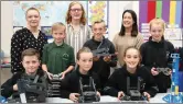  ??  ?? Teachers Angela de Róiste, Máire Ní Mhainnín and Treasa Ní Choileáin with 5th Class pupils Adam, Emma, Cáit, Jayden, Tomás and Sophie with Vex Robotics Projects pupils have completed.