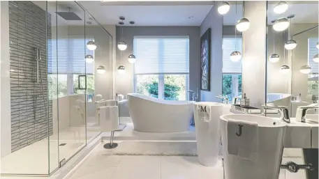  ??  ?? The Ottawa Citizen People's Choice Award went to Greenmark Builders for a dreamy ensuite layered in white and light.