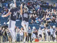  ?? Yale Athletics / Contribute­d photo ?? Yale’s Reed Klubnik, left, and JP Shohfi celebrate during Saturday’s win over Columbia. Both have a chance to break Ralph Plumb’s program record for career receiving yards when the Bulldogs play at Princeton on Saturday.
