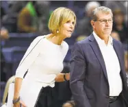  ?? Jessica Hill / Associated Press ?? Under UConn associate head coach Chris Dailey and head coach Geno Auriemma, the Huskies have won a record 11 national titles.