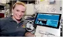  ?? ?? NASA astronaut Kate Rubins uses nanopore sequencing technology in space for the first time in August 2016.
