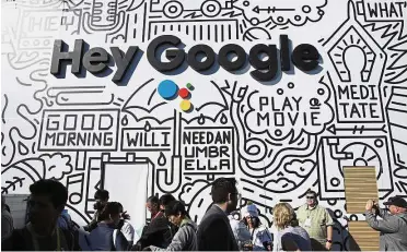  ??  ?? Research centre: People wait in line to enter the Google booth at CES Internatio­nal in Las Vegas. Google will create an AI lab in Paris dedicated to fundamenta­l research on themes like automatic learning, language and a computer’s ability to see. — AP