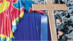  ??  ?? Above: Nicholas at King Michael I’s funeral. Left, Prince Harry and Meghan Markle