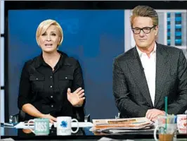  ?? CAROLYN COLE/LOS ANGELES TIMES ?? “Morning Joe” co-hosts Mika Brzezinski, left, and Joe Scarboroug­h, shown in March, addressed President Donald Trump’s behavior and accused the president of lying Friday.