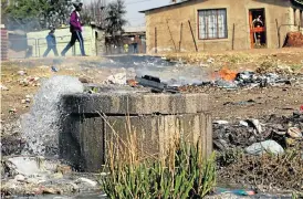  ?? /Sandile Ndlovu/ Sowetan ?? Endangerin­g lives: Sewage spillage in Boipatong contaminat­es water in the Vaal catchment area. After an anonymous complaint, an official inquiry is set for September.