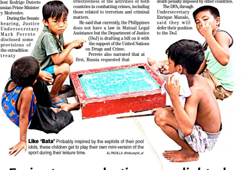  ?? AL PADILLA @tribunephl_al ?? Like ‘Bata’ Probably inspired by the exploits of their pool idols, these children get to play their own mini-version of the sport during their leisure time.