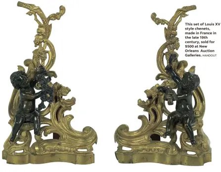  ?? HANDOUT ?? This set of Louis XV style chenets, made in France in the late 19th century, sold for $500 at New Orleans Auction Galleries.