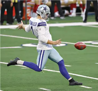  ?? AP Photo/Ron Jenkins ?? ■ Dallas Cowboys punter Hunter Niswander (1) punts against the San Francisco 49ers in an NFL game Sunday in Arlington, Texas.