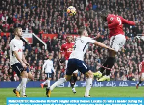  ??  ?? MAMCHESTER: Manchester United’s Belgian striker Romelu Lukaku (R) wins a header during the English Premier League football match between Manchester United and Tottenham Hotspur at Old Trafford in Manchester, north west England. — AFP