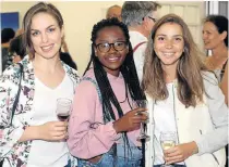 ?? Picture: BRIAN WITBOOI ?? STUDENT STYLE: Friends, from left, Lauren Muller, Lerato Selekisha and Mariana Dalman at the opening of the masters group exhibition at NMU Art Gallery in Bird Street last week