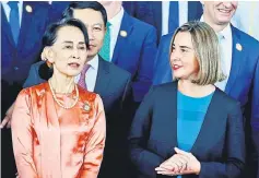  ??  ?? Suu Kyi talks with Mogherini during the 13th Asia Europe Foreign Ministers Meeting (Asem) in Naypyitaw. — Reuters photo