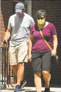  ?? Brian A. Pounds / Hearst Connecticu­t Media ?? Robert and Jeanette Manfredoni­a, of Newtown, parents of Peter Manfredoni­a, leave state Superior Court in Milford after Peter’s arraignmen­t on murder and kidnapping charges on Tuesday.