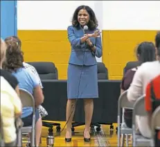  ??  ?? Kelley Castlin-Gacutan, a candidate for Woodland Hills School District superinten­dent, speaks July 23 at an introducto­ry event for the candidates at the school district’s administra­tive building in Braddock.