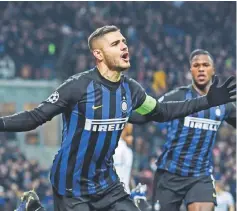  ??  ?? Inter Milan’s Argentine forward Mauro Icardi celebrates after scoring an equalizer at the San Siro stadium in Milan. — AFP photo