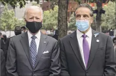  ?? Amr Alfiky / New York Times ?? President Joe Biden told ABC News that Gov. Andrew Cuomo should resign if the state attorney general’s probe confirms the sexual harassment allegation­s against him. The two men are seen at an event marking the 19th anniversar­y of the 9/11 terrorist attack in New York on Sept. 11, 2020.