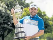  ?? EPA ?? Louis Oosthuizen poses with the South African Open trophy.