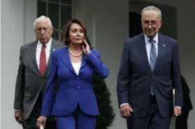  ?? TNS ?? U.S. House Speaker Nancy Pelosi leaves the White House on Wednesday with Senate Minority Leader Chuck Schumer, D-N.Y. (right), and House Majority Leader Steny Hoyer, D-Md. Ms. Pelosi’s drug bill could hurt her party at shot at a big political win in November.