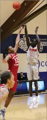  ?? Submitted photo ?? Akok Akok, right, is one of PC’s main targets in the 2019 recruiting class. The Putnam Sciences wing would help the Friars in two areas, according to Putnam coach Thomas Espinosa. Akok is a solid 3-point shooter who can also block shots.