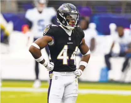 ?? /TERRANCE WILLIAMS/AP ?? Ravens cornerback Marlon Humphrey catches a breather during the first half of Sunday’s game against Tennessee.