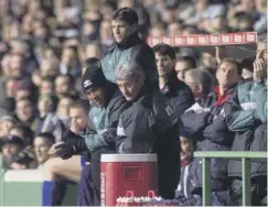  ??  ?? 0 A subdued Celtic dugout as John Barnes, left, and his assistants Eric Black and Terry Mcdermott suffer the humiliatio­n of defeat.