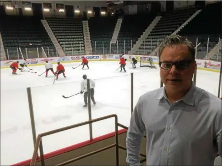  ?? PAUL POST — PPOST@DIGITALFIR­STMEDIA.COM ?? Jeff Mead checks out an Adirondack Thunder hockey team practice at Cool Insuring Arena in Glens Falls. As general manager, he’s in charge of daily business operations.