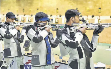  ?? BURHAAN KINU/HT PHOTO ?? Indian shooters take part in a training session in New Delhi on Friday before the World Cup commences on Saturday.