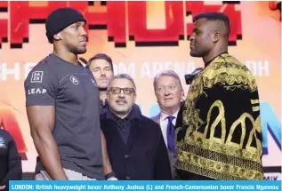  ?? ?? LONDON: British heavyweigh­t boxer Anthony Joshua (L) and French-Cameroonia­n boxer Francis Ngannou