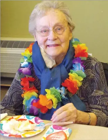  ?? BARB AGUIAR/Westside Weekly ?? Margaret Froment celebrated her 108th birthday with cake and a glass of wine with family, friends and staff at lakeview Lodge Saturday afternoon.