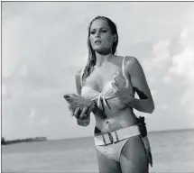  ?? The Associated Press/files ?? Ursula Andress emerges from the sea in the 1962 James Bond film Dr. No. and instantly created an iconic role.