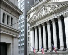  ?? ASSOCIATED PRESS ?? This Nov. 23 file photo shows the New York Stock Exchange (right) in New York.