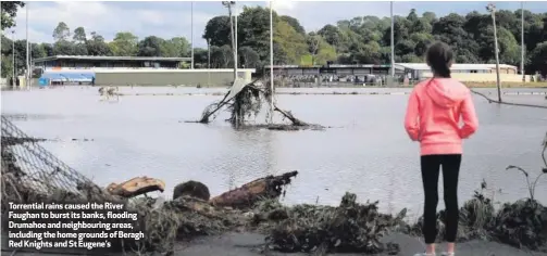  ??  ?? Torrential rains caused the River Faughan to burst its banks, flooding Drumahoe and neighbouri­ng areas, including the home grounds of Beragh Red Knights and St Eugene’s