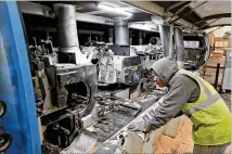  ?? BOB ANDRES/AJC 2019 ?? An employee sets up a molding machine for a run of molding. Metro Atlanta had the smallest increase in salaries and wages (3.4%) from March 2021 to March 2022 compared to other metro areas (the national average is 5%).