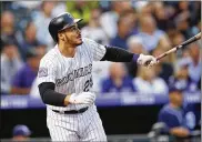  ?? DAVID ZALUBOWSKI / AP 2018 ?? Colorado Rockies All-Star third baseman Nolan Arenado finished last season hitting .297, with 38 homers and 110 RBIs. He’s a maestro at third in picking up his sixth straight Gold Glove.