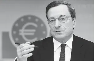  ?? Ralph Orlowski / Bloomberg News ?? Mario Draghi, president of the European Central Bank, tells reporters
in Frankfurt on Thursday that further stimulus may not be needed.