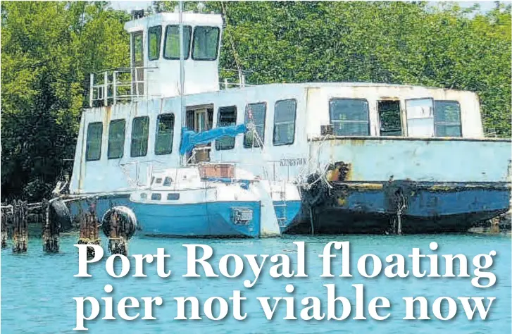  ?? PHOTOS BY PAUL WILLIAMS ?? A Port Royal ferry of yesteryear at eternal rest in a lagoon of the Port Royal mangroves.