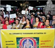  ?? IANS ?? Devotees stage a protest against entry of two women into the Sabarimala temple of Lord Ayyappa, at Victoria Memorial, in Kolkata, on 5 January.