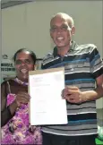  ??  ?? Santha and Jayaseelan Maduray from Rainham in Phoenix withtheir precious document.