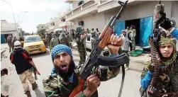  ?? (الوطن) ?? عناصر من إحدى الجماعات المسلحة في ليبيا طرابلس: الوكالات