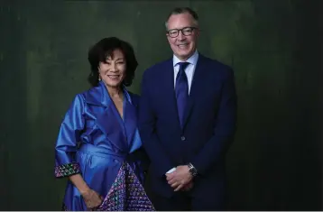  ?? CHRIS PIZZELLO — THE ASSOCIATED PRESS ?? President of the Academy of Motion Picture Arts and Sciences Janet Yang, left, and CEO of the Academy of Motion Picture Arts and Sciences Bill Kramer pose for a portrait during the 96th Academy Awards Oscar nominees luncheon on Feb. 12 at the Beverly Hilton Hotel in Beverly Hills. The Academy Awards will take place March 10.