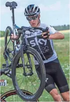  ?? JEFF PACHOUD, POOL PHOTO VIA AP ?? Britain’s Chris Froome gets back on the road after crashing during the first stage of the Tour de France on Saturday.