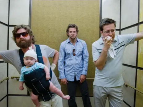  ?? REUTERS ?? You’ve got a hangover so celebrate by watching the 2009 movie starring, from left, Zach Galifianak­is, Bradley Cooper and Ed Helms.