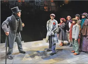  ?? Photo by Mark Turek ?? Pictured from left: Joe Wilson Jr. as Ebenezer Scrooge and David- Allen Sumner, Sofia Borges, Qiana Sumner, Joshua Pacheco, Samuel Wright, and Anai Nightingal­e as Ensemble in ‘A Christmas Carol,’ directed by Angela Brazil and Stephen Thorne at Trinity...