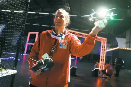  ?? Scott Strazzante / The Chronicle ?? Jonathan Gaiser of Sunnyvale holds his drone after a heat during the drag race contest at S.F.’s Palace of Fine Arts Theater.