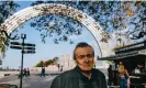  ?? Julia Kochetova/The Guardian ?? Composer Yevhen Stankovych in front of the monument to freedom. Photograph: