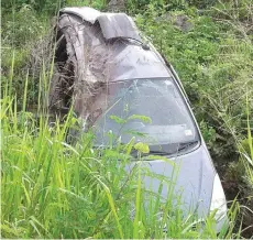  ?? Photo: Arishma Devi Narayan ?? The car which ended in a slope at Malamala in Nadi yesterday.